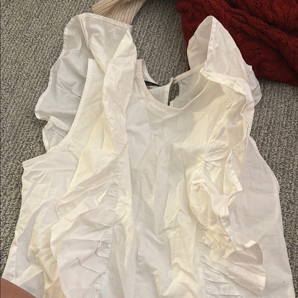 Deluc Cream Ruffled Sleeveless Blouse with Bib Collar